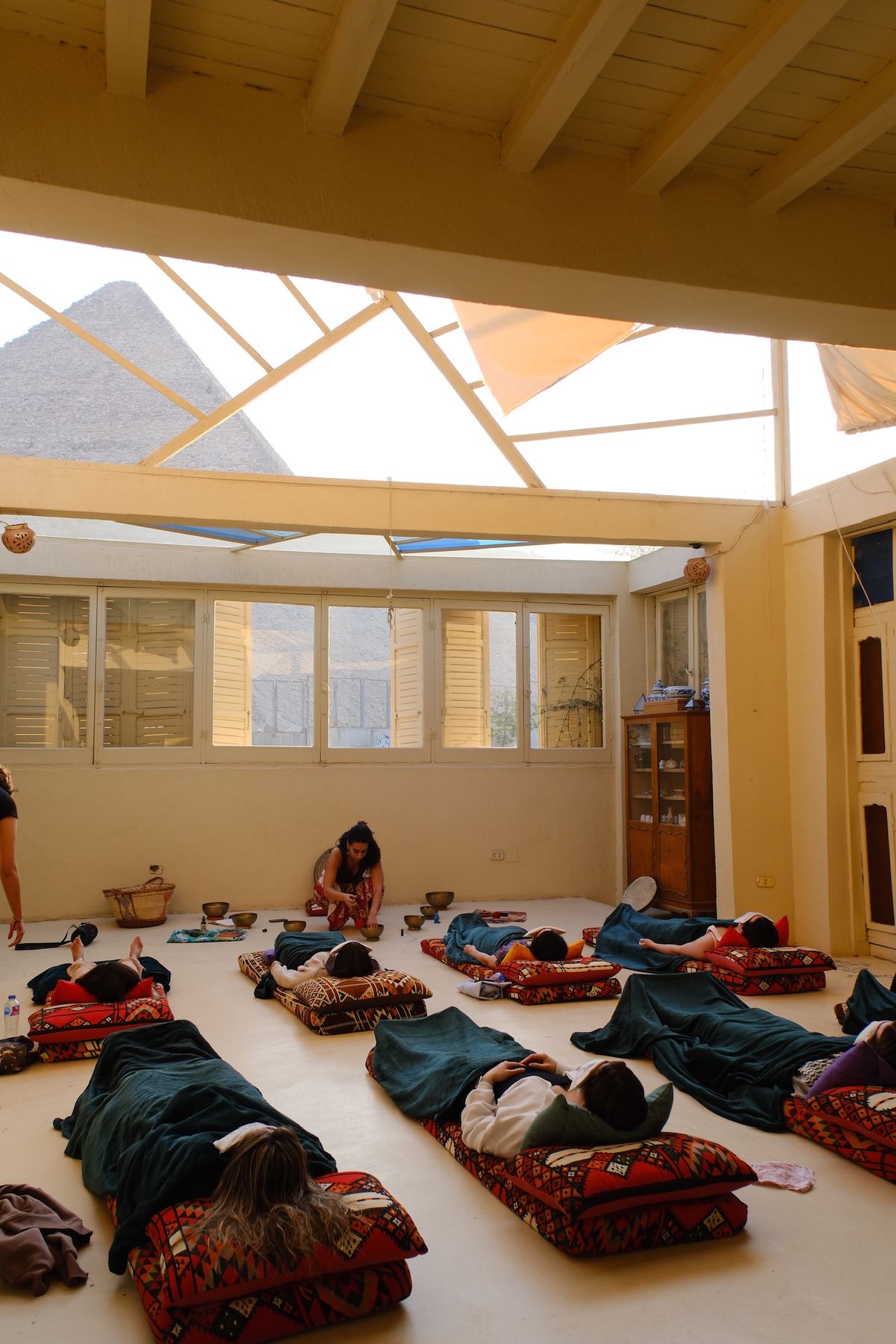 Sound healing session with the pyramids in the background